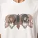CAMISETA MCD REGULAR SKULL RELEVO