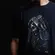 CAMISETA MCD SANTA DOURADA