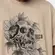 CAMISETA MCD REGULAR CAVEIRA CALIGRAFITTI