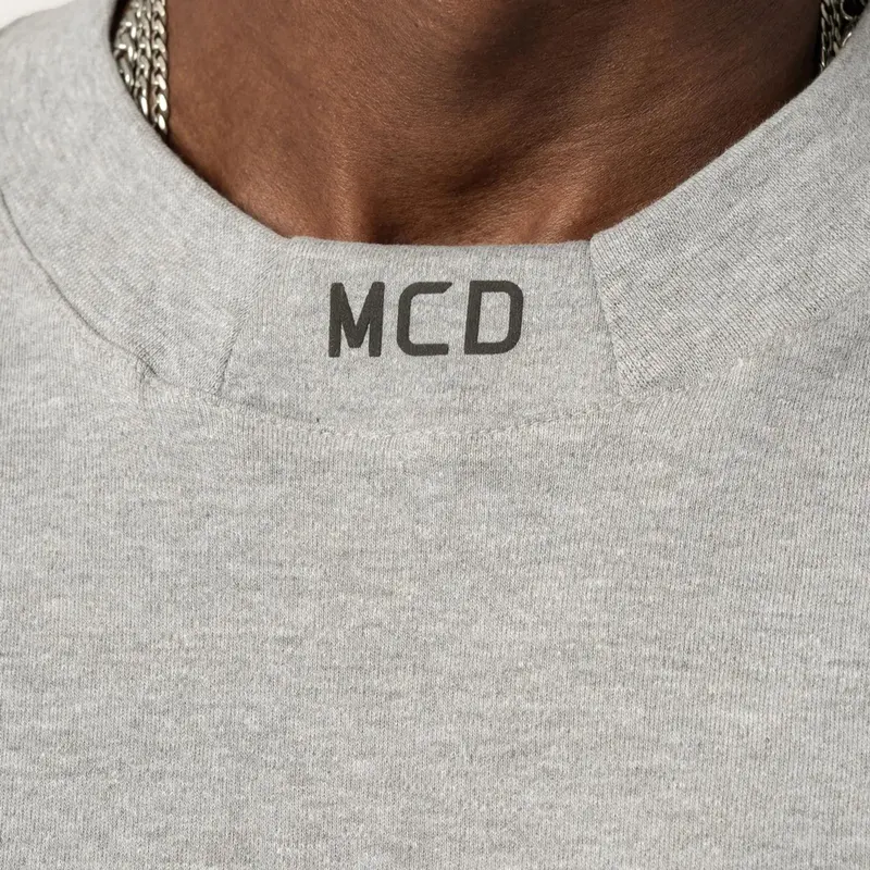 CAMISETA MCD BOX FIT GOLA MCD CINZA MESCLA