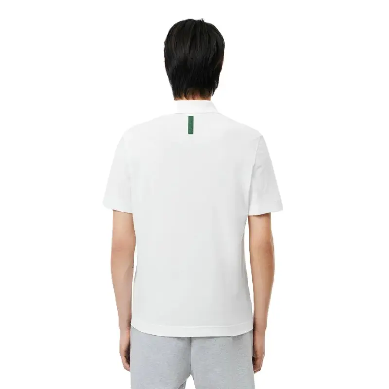 POLO LACOSTE MOVEMENT REGULAR FIT WHITE