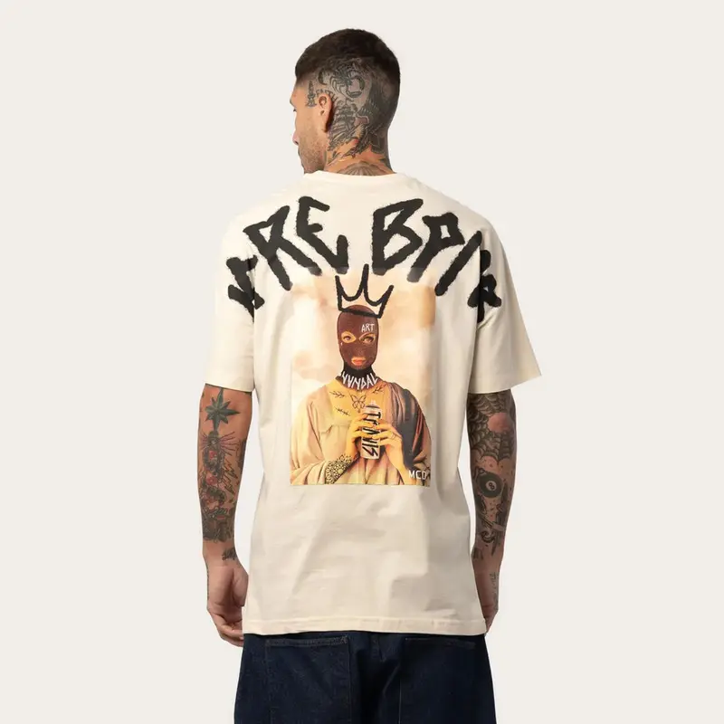 CAMISETA MCD ESPECIAL HOPE TRAVIS BOMB CREME ARCANJO