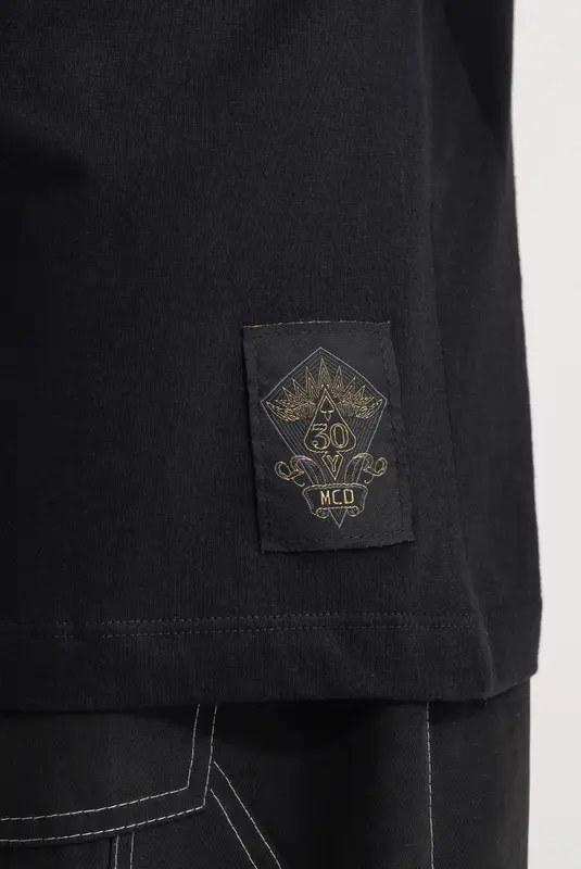 CAMISETA MCD 30 ANOS PIPA OVERSIZED PRETO